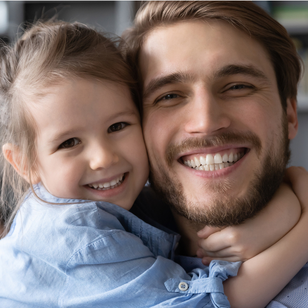 Father & Daughter Smiling